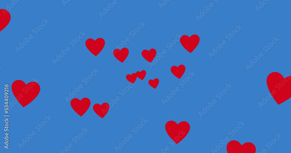 Image of red hearts spread on blue background