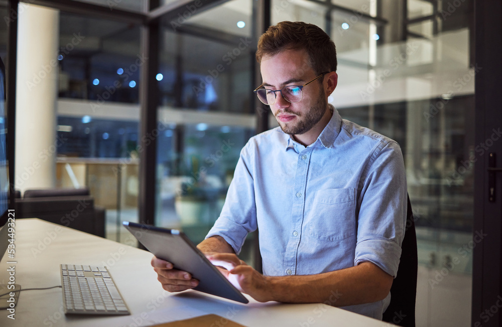 Business tablet, internet research and businessman working online with digital tech in a dark office