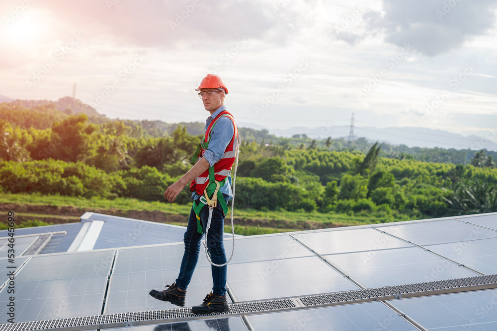 Solar PV Rooftop,Engineer and workers installation solar cell on the roof of factory industry.