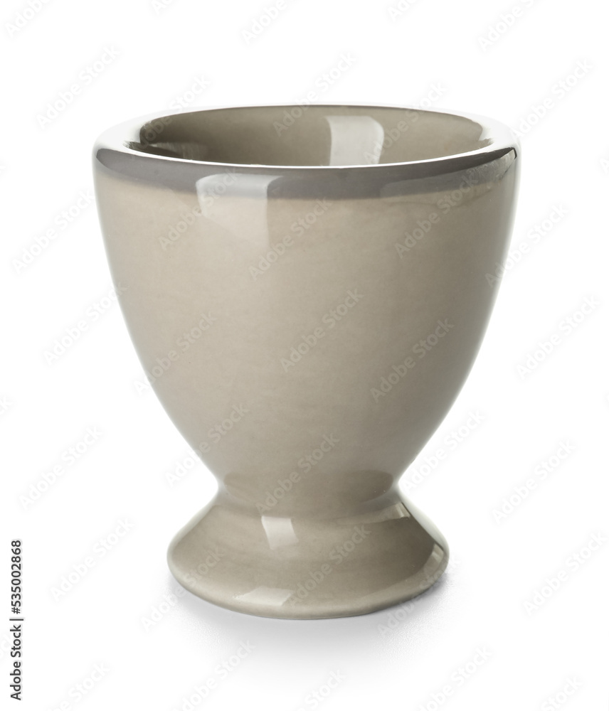 Ceramic egg holder on white background