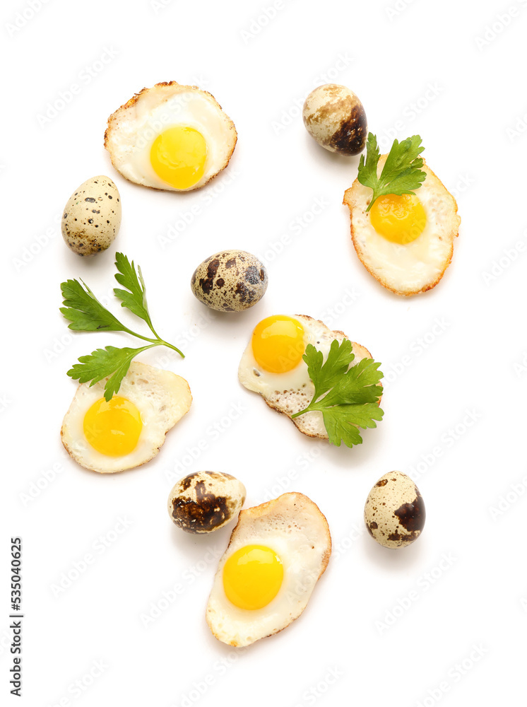 Composition with fried and raw quail eggs on white background