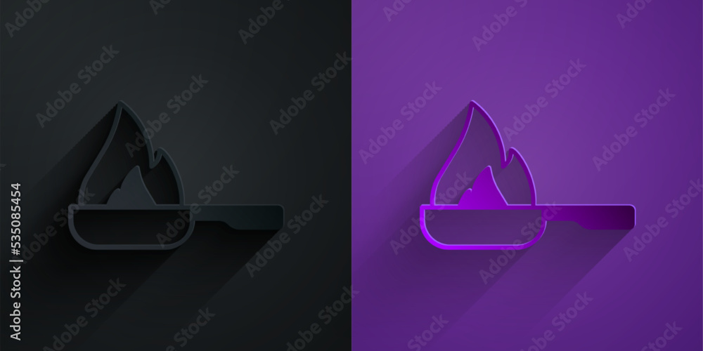 Paper cut Frying pan icon isolated on black on purple background. Fry or roast food symbol. Paper ar