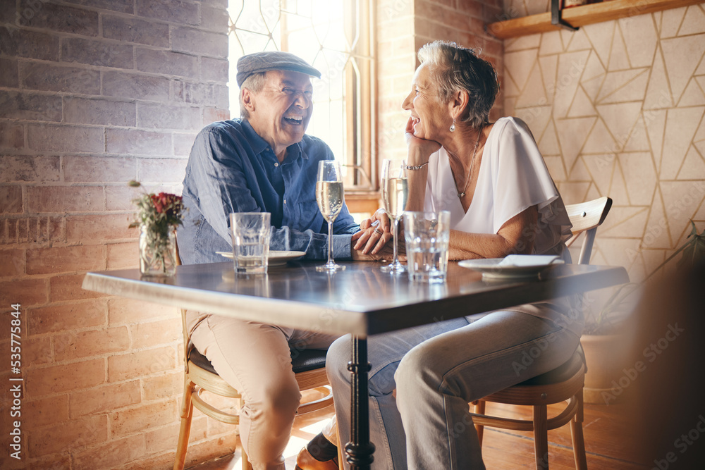 Love, smile and old couple holding hands in restaurant with champagne glasses and laughing. Romance,