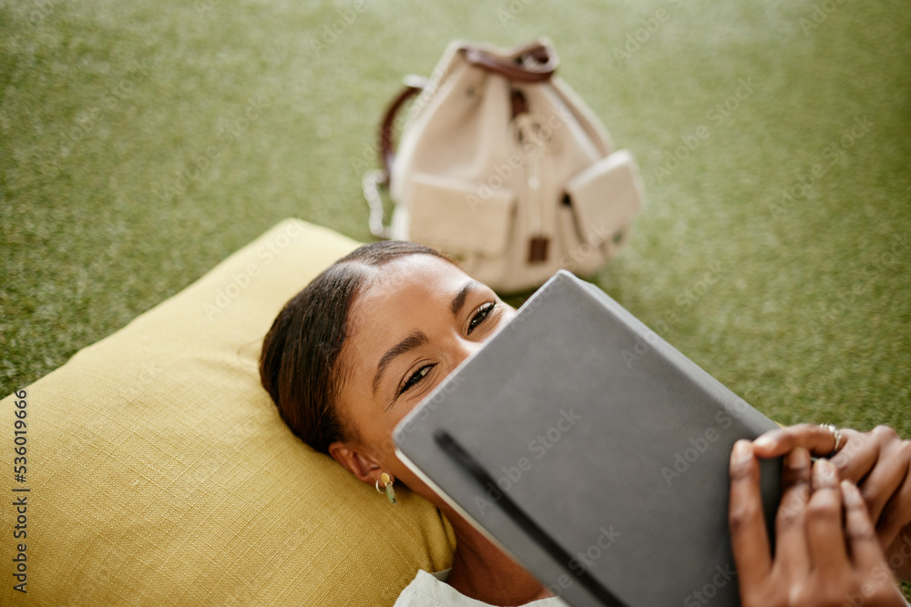 Shy student, notebook and hiding face in study, learning and education break on turf grass in school