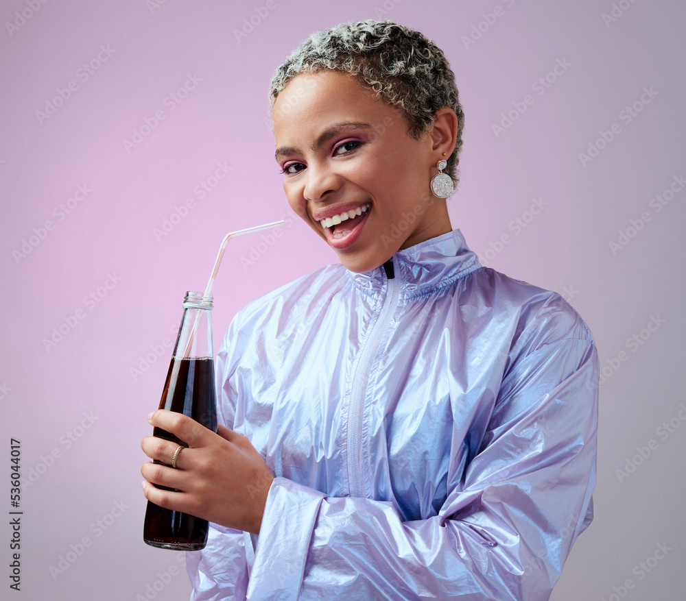 Happy, excited and portrait of a black woman with a soda in a studio with a purple background. Styli