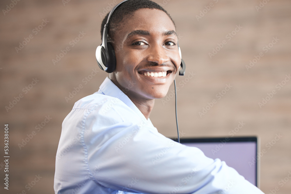 Contact us customer support and black man web help worker on an office internet consultation. Portra