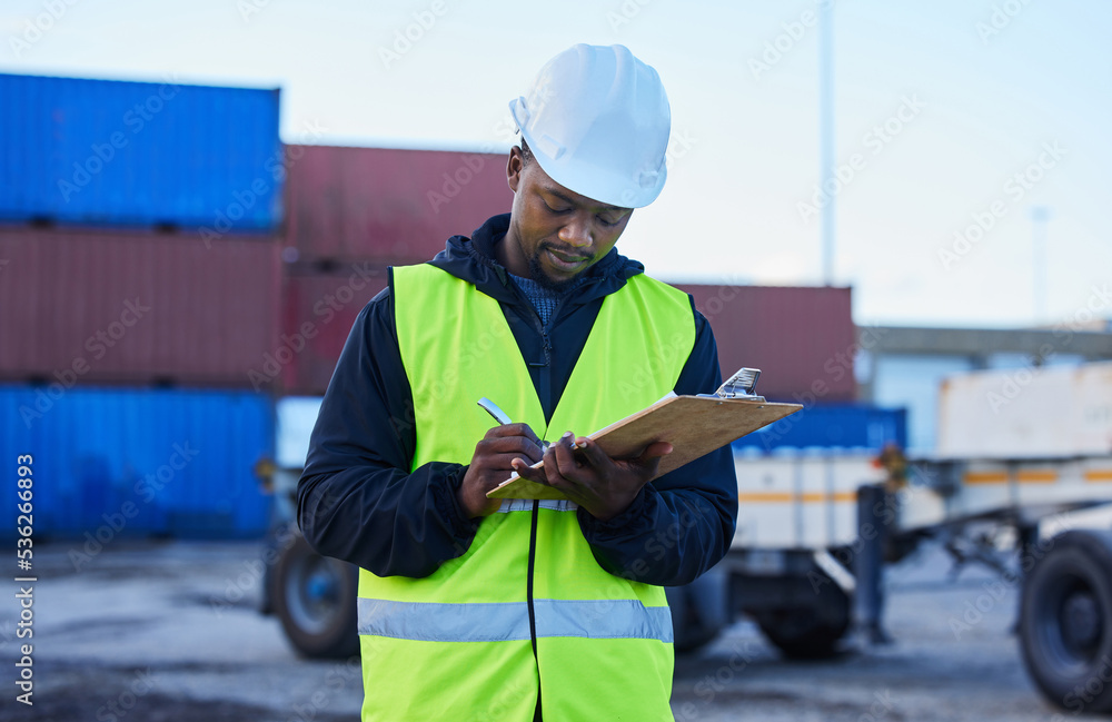 Engineer, cargo and black man writing shipping or delivery inspection report for control at shipyard