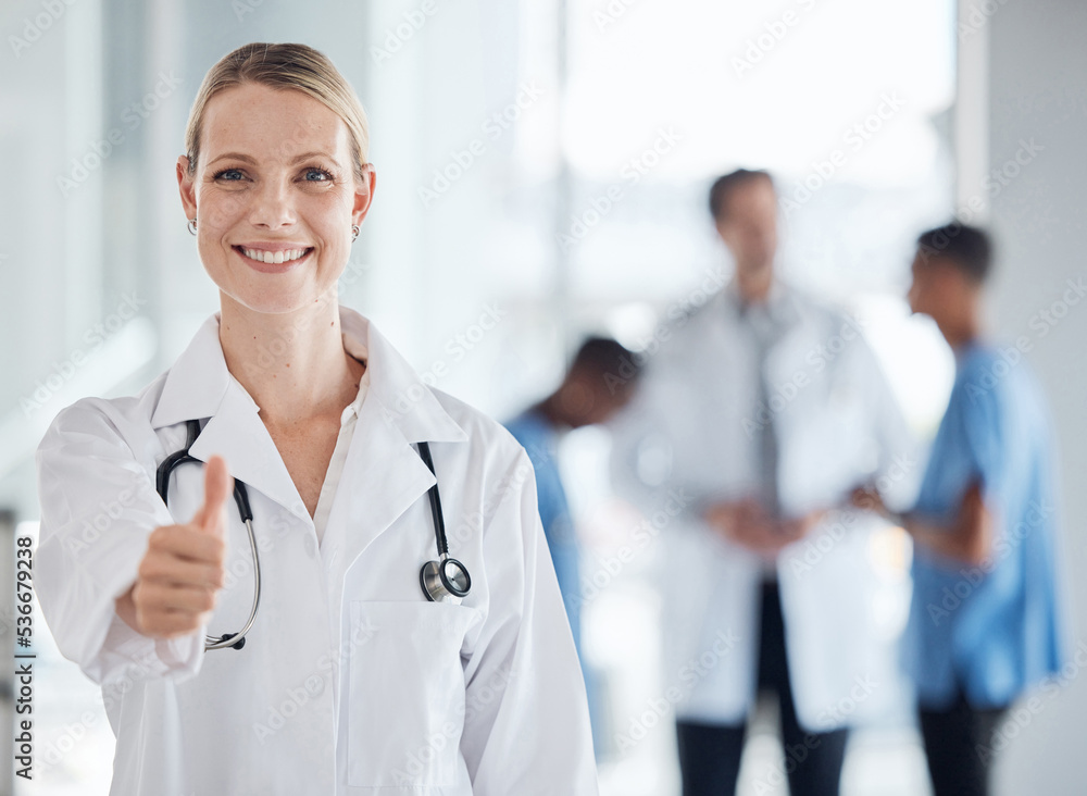 Thumbs up, smile and happy doctor, woman or success in a medical hospital. Portrait like gesture or 