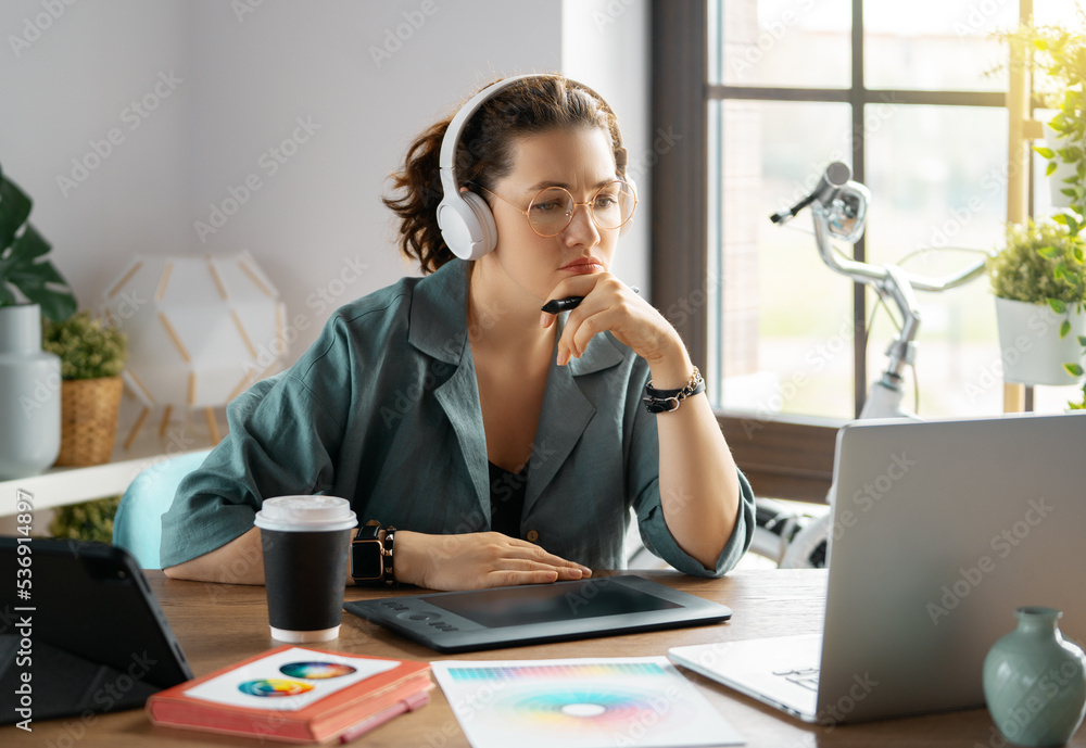 Woman is working at workshop