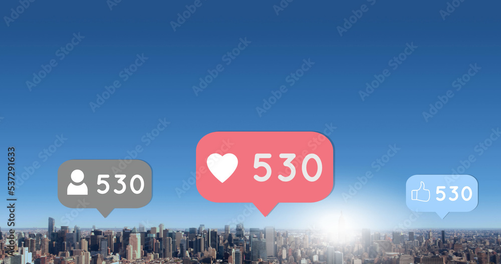 Image of social media reactions over cityscape