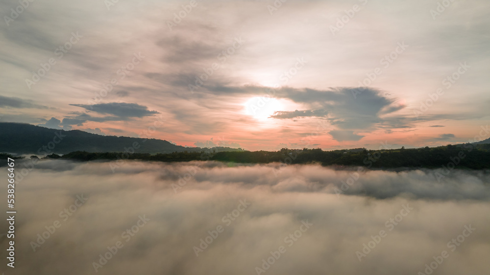 Mountains in fog at beautiful autumn in Phetchabun Thailand. Fog mountain valley, low clouds, forest