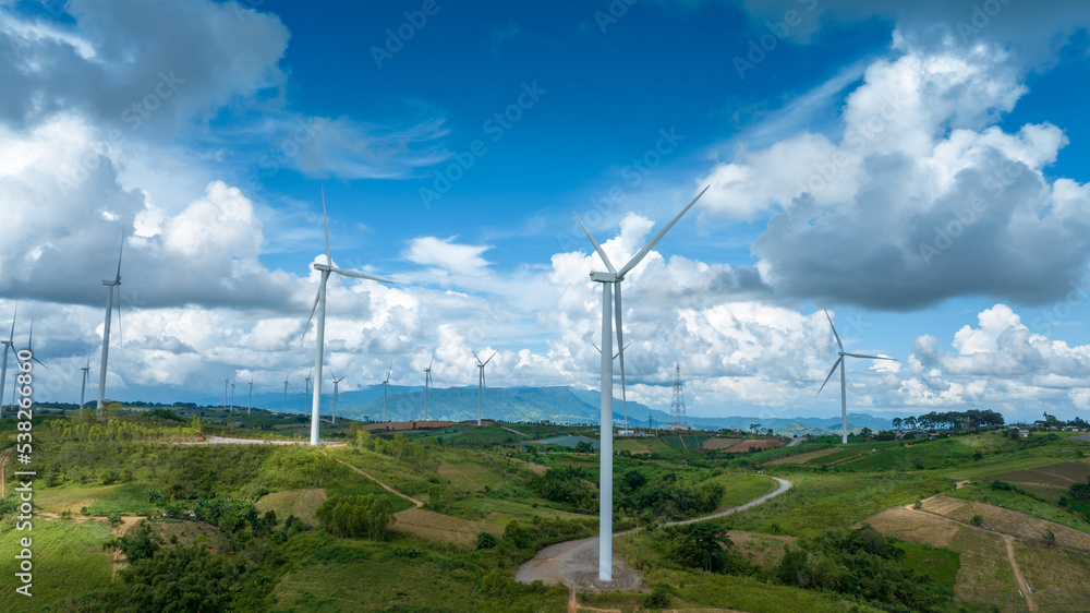 Wind Turbines Windmill Energy Farm, Windmill on blue sky puffy clouds Alternative energy sources. Re