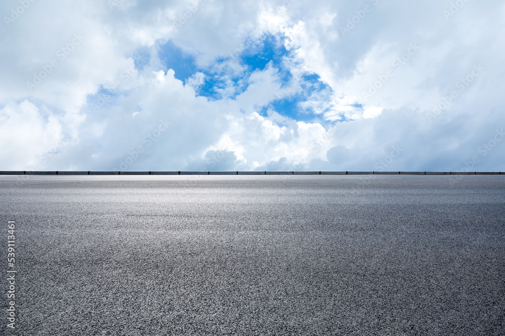 Asphalt road and sky cloud under blue sky. Road and sky background.