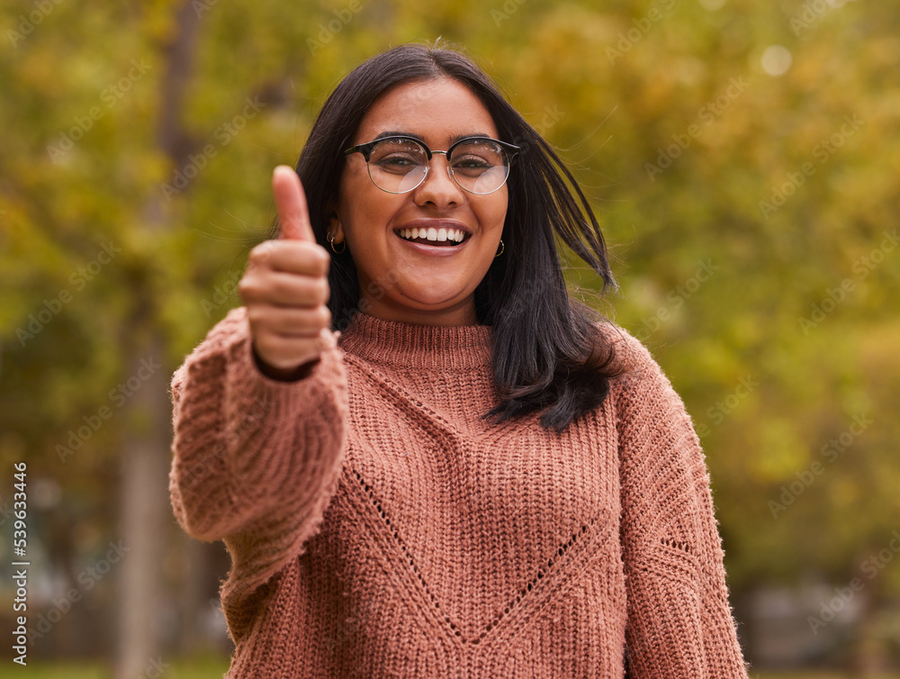 Thumbs up, like and Indian woman in park for outdoor support, volunteer in eco environment or green 