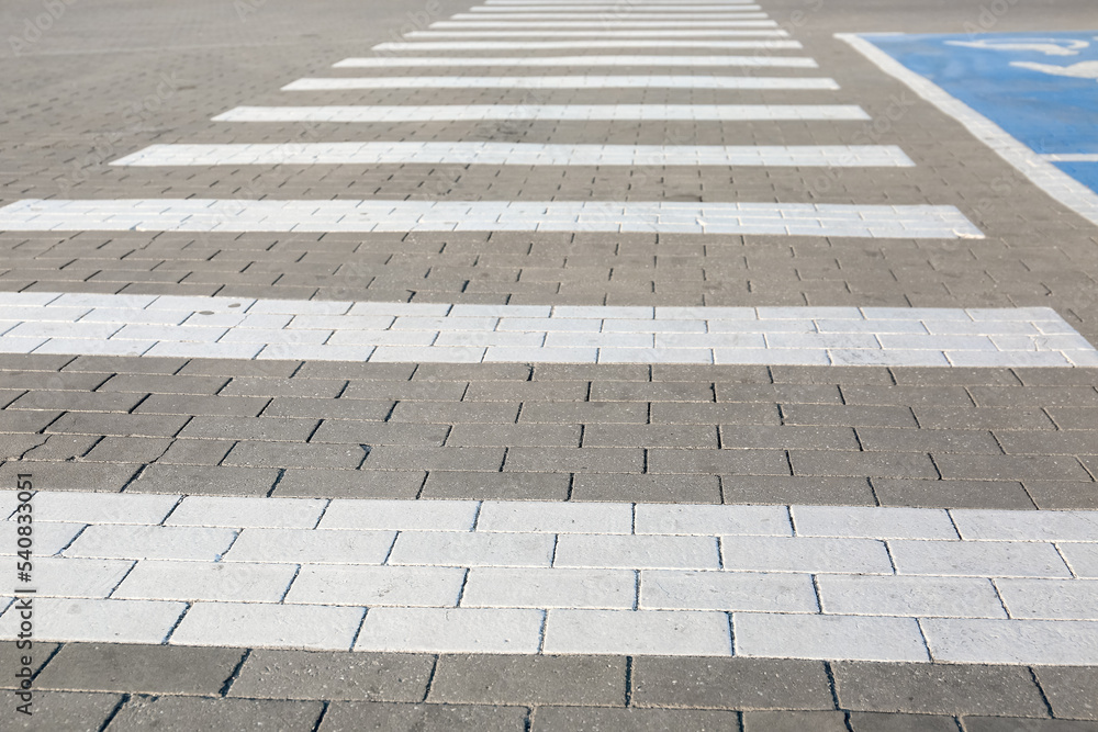 Zebra crossing on parking lot