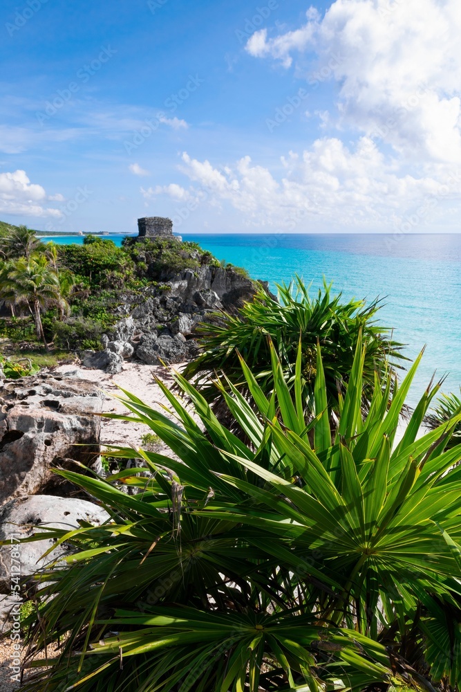 Vertical distant view of the historical Tulum Archaeological Zone ruins in Mexico