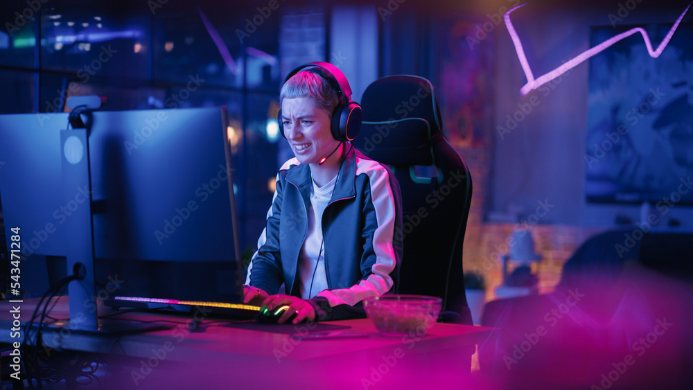 Excited Female Gamer Playing Online Video Game on Computer. Portrait of Slightly Disappointed Woman 