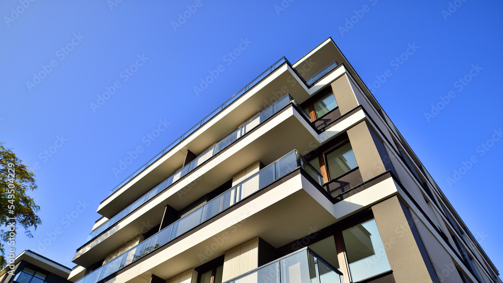 New apartment building on a sunny day. Modern residential architecture. The apartment is waiting for