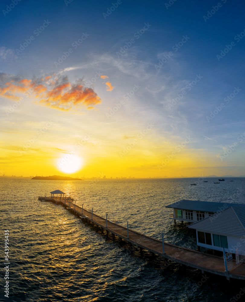 beautiful tropical sunset abandoned Pier and sea