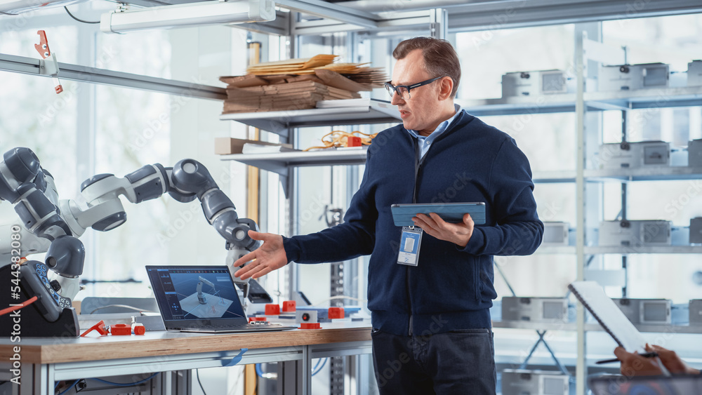 In Robotics Development Laboratory: Future Engineers and Scientists Work on Automated Robotic Arm Pr