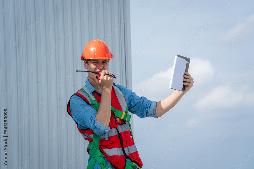 Engineer or worker installing a solar cell on the roof in warehouse factory,Eco technology for elect