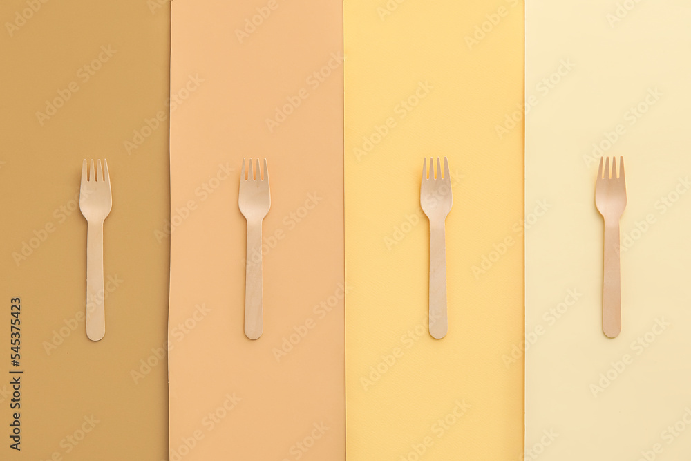 Eco forks on color background