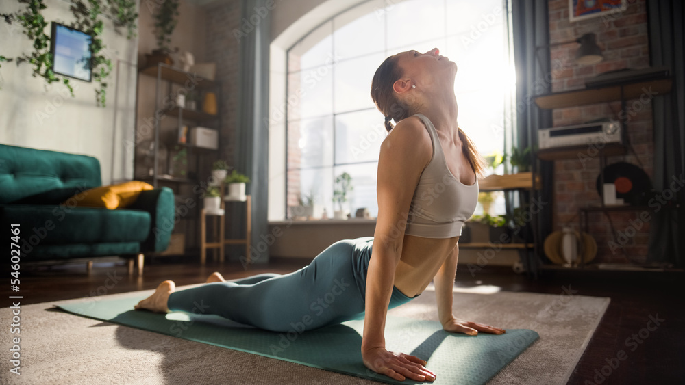 Close Up Portrait of a Happy Fit Young Woman Doing Stretching and Yoga Exercises During Morning Work