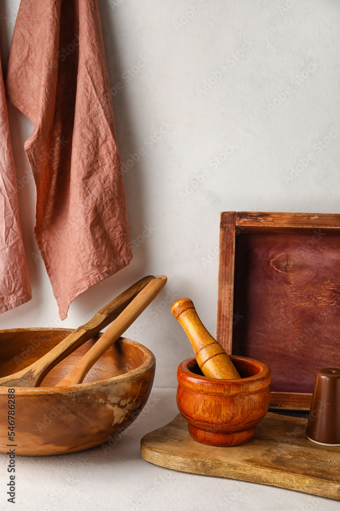 Wooden cooking utensils on white background