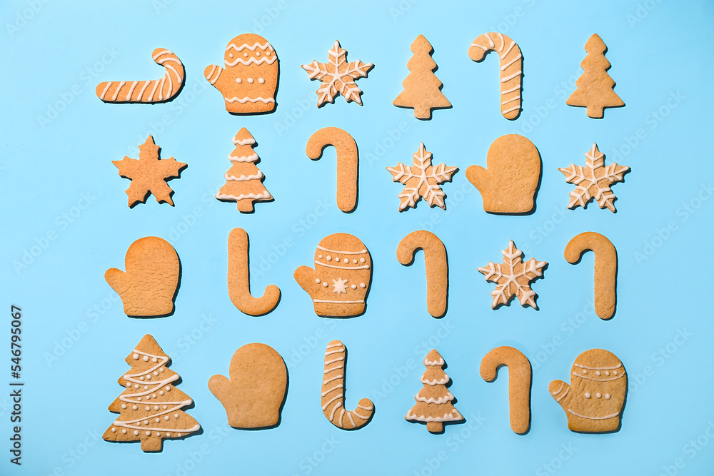 Set of tasty Christmas cookies on color background