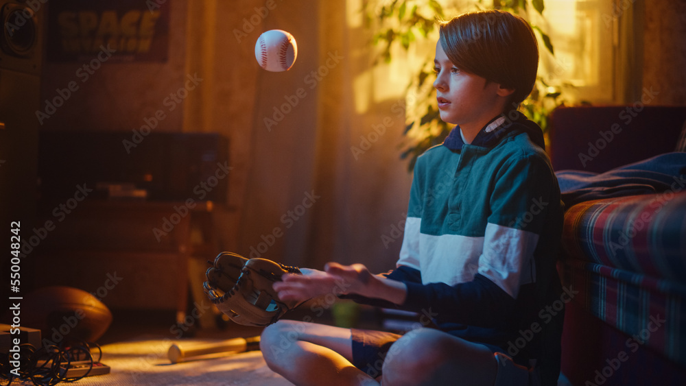 Young Sports Fan Playing with Baseball Ball and Glove at Home in Living Room with Vintage Interior. 