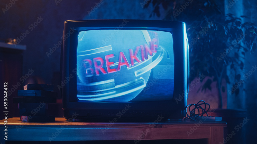 Close Up Footage of a Dated TV Screen. Breaking News Report Starting. Intro with Word Breaking Revol