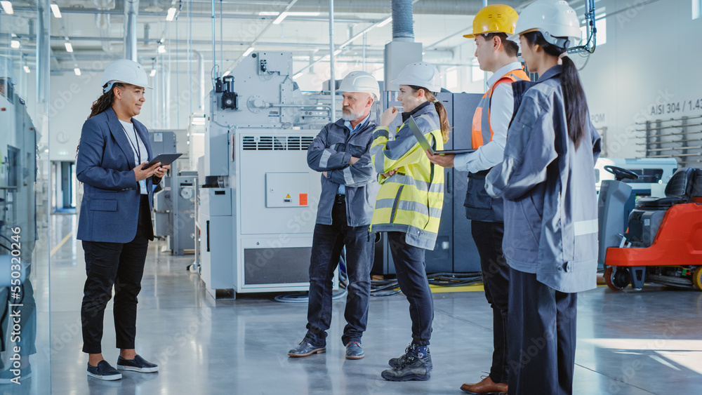 Factory Meeting: Black Female Chief Engineer Talking to Colleagues Before Work Day in Heavy Industry