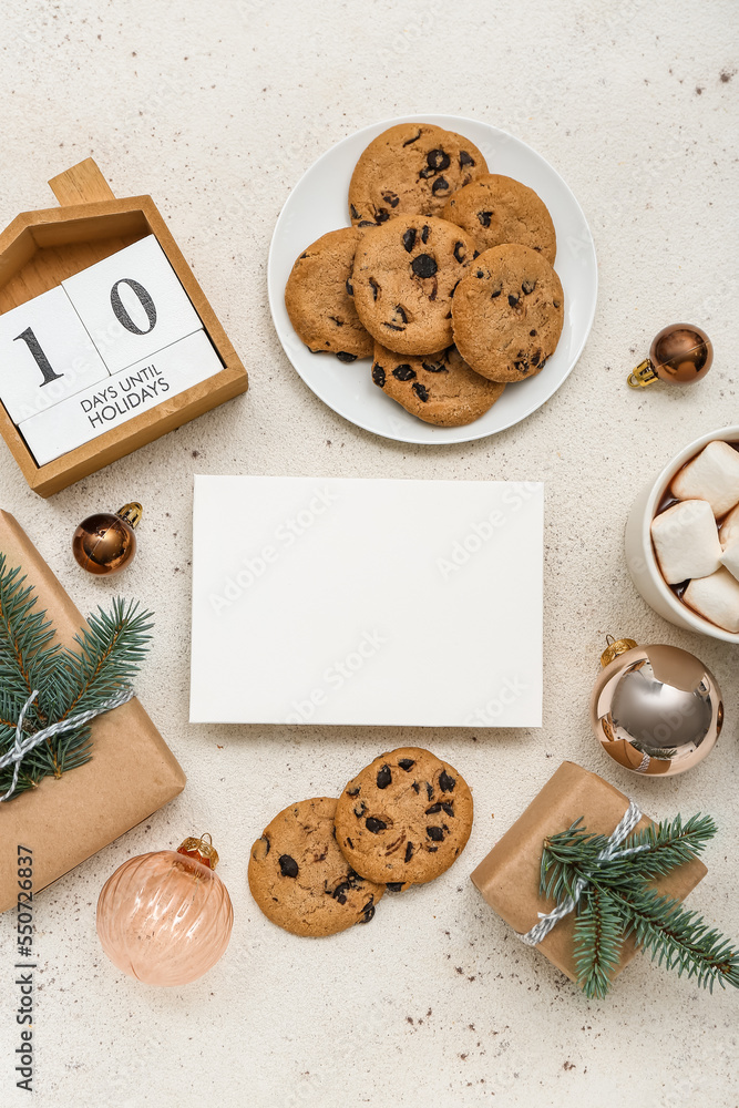 Calendar with text 10 DAYS UNTIL HOLIDAYS, blank card, cookies, cup of cocoa, Christmas gifts and de