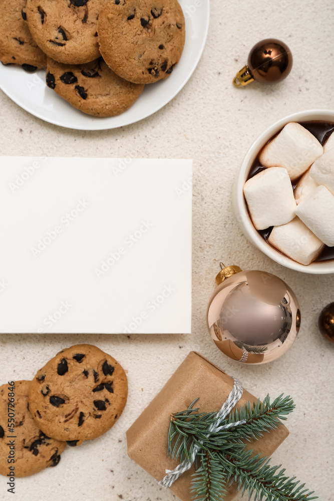 Blank card with cookies, cup of cocoa, Christmas gift and balls on white background