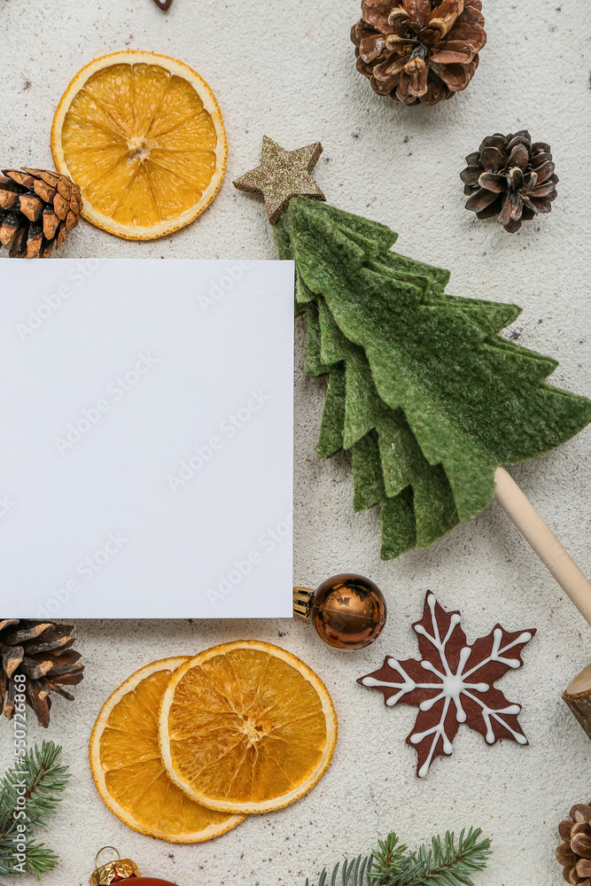 Blank card with Christmas decor and treats on white background