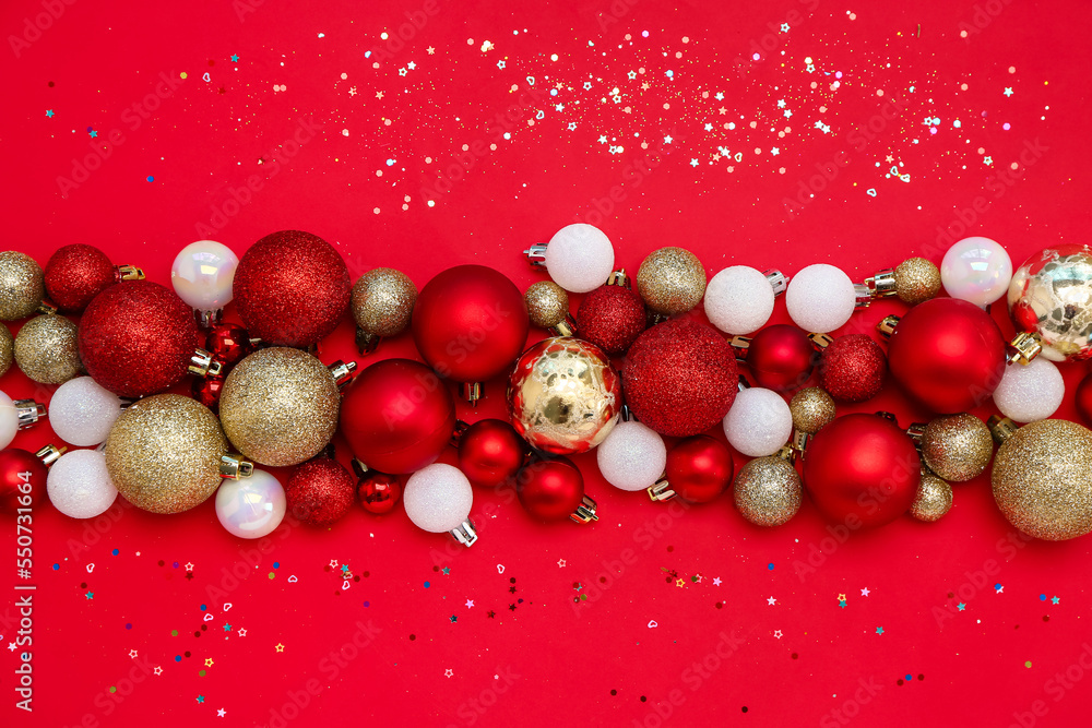 Christmas balls with sequins on red background