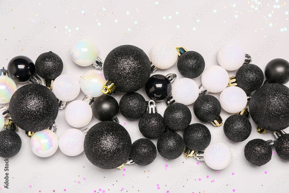 Christmas balls with sequins on white background