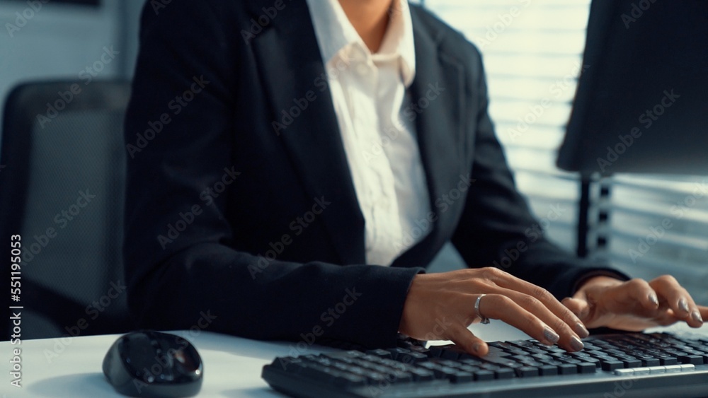 Competent female operator working on computer and talking with clients. Concept relevant to both cal