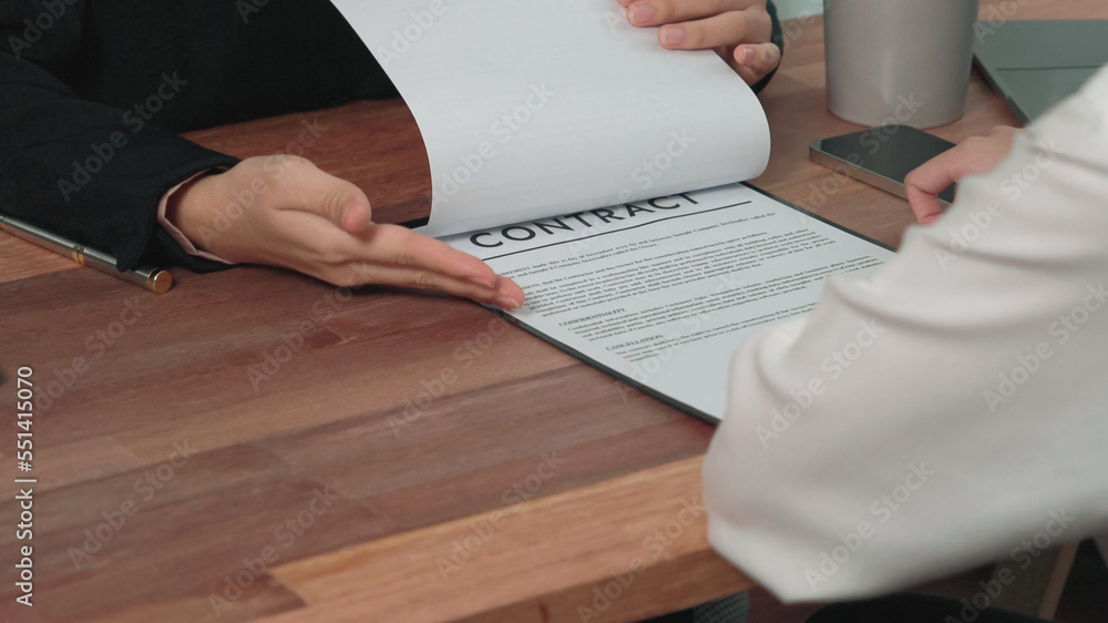 Closeup young enthusiastic businesswoman negotiate financial business contract in the office. Client