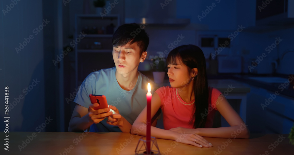 asian couple with power outage