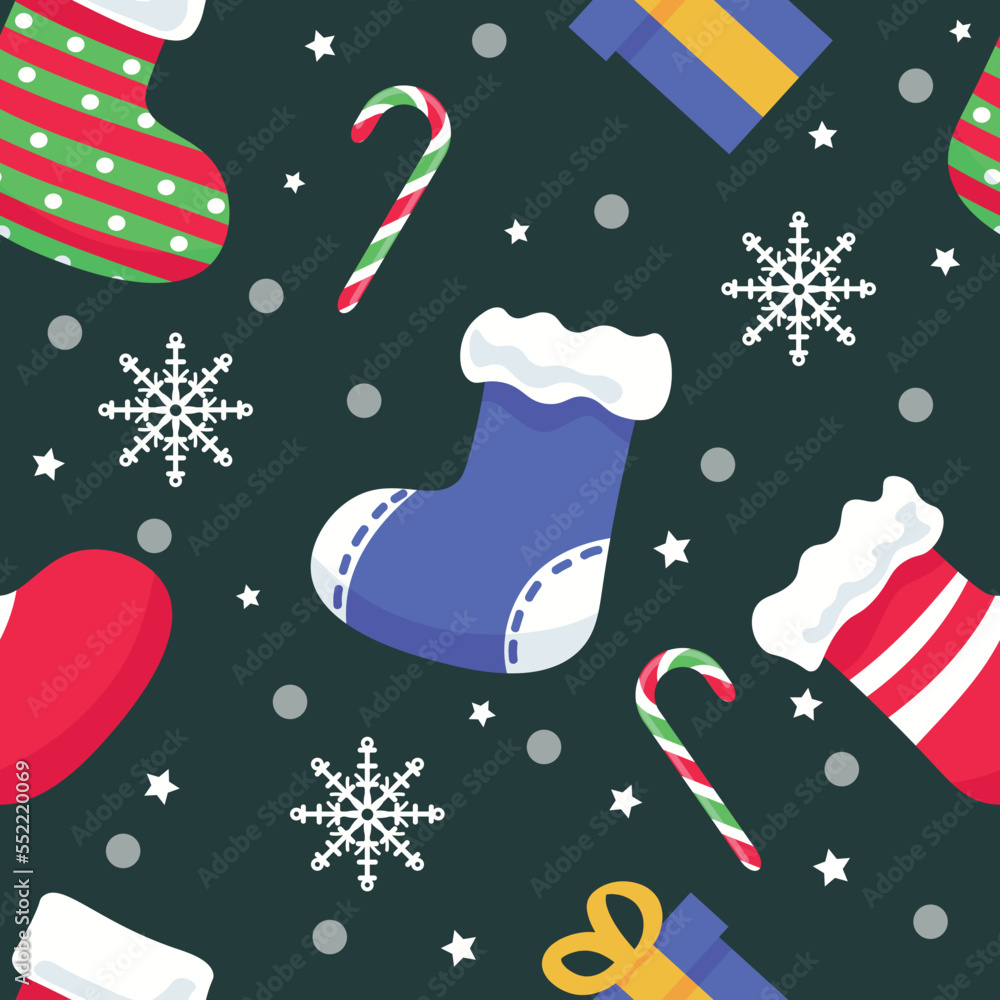 Christmas socks with snow and decorations on dark background. Pattern for design