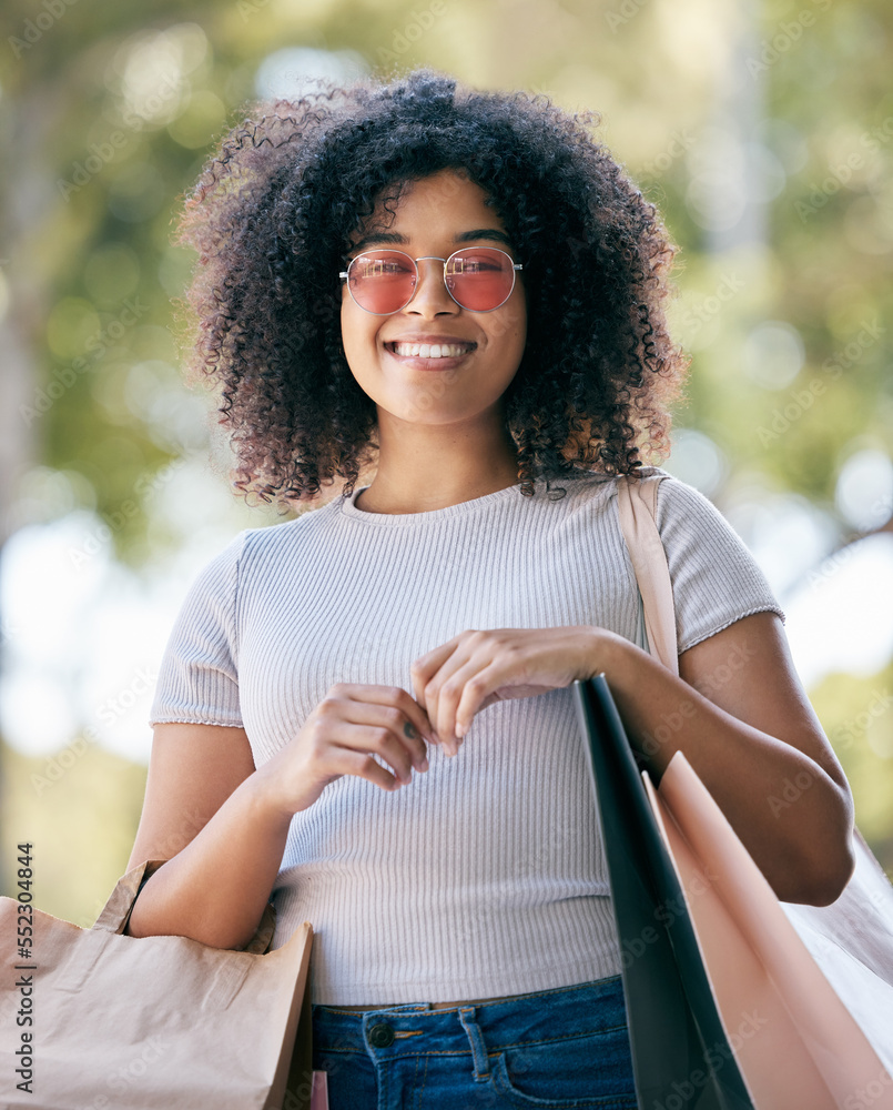 Woman, shopping and bags outdoor for expensive purchase and buying items. Young black woman, custome