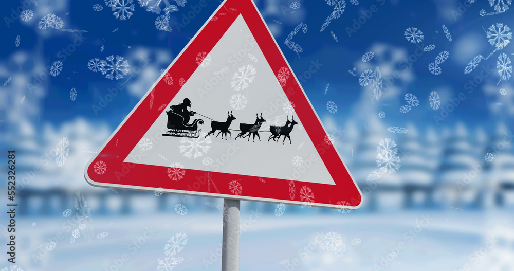 Snowflakes falling against santa claus in sleigh being pulled by reindeers on stop sign