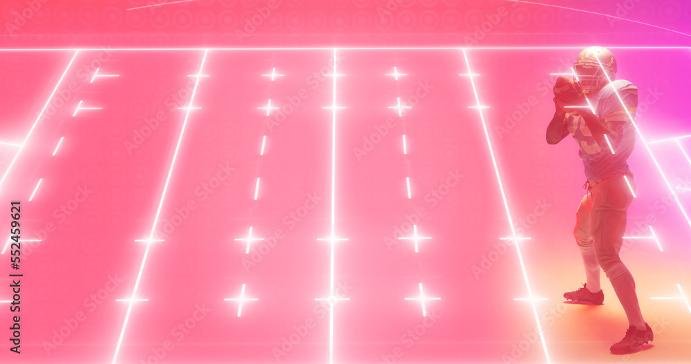 Composite of illuminated american football ground and player with ball playing on pink background