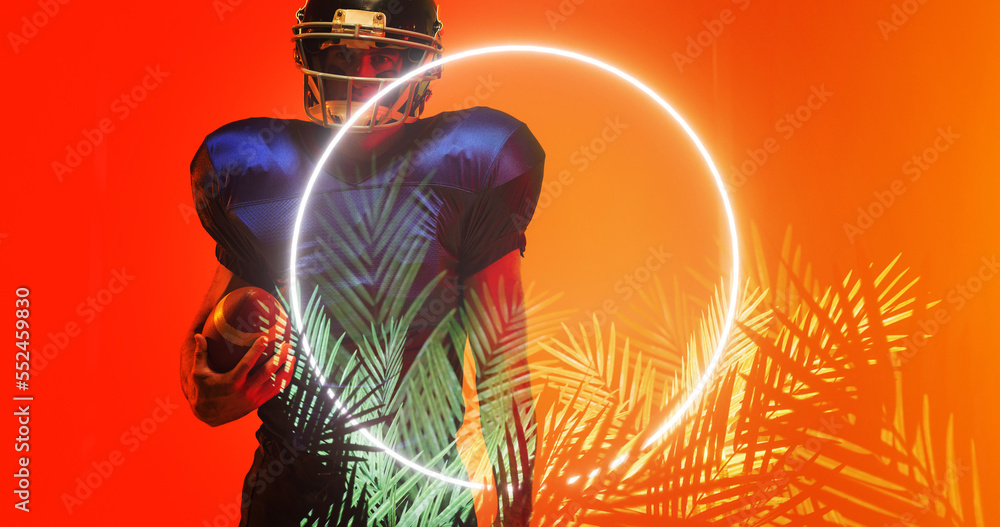 Composite of american football player wearing helmet with ball standing by circle and plants