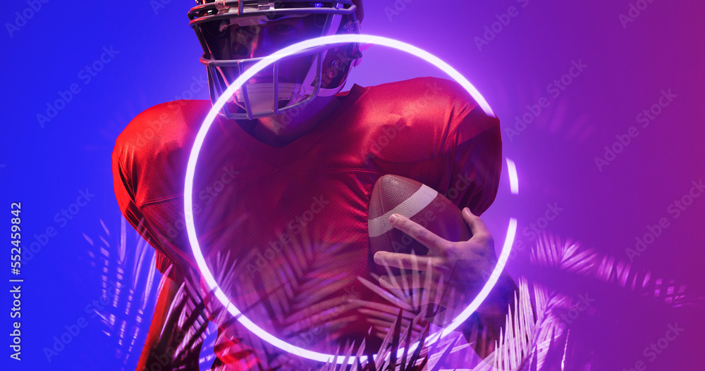 Composite of american football player wearing helmet and holding ball by plants and circle