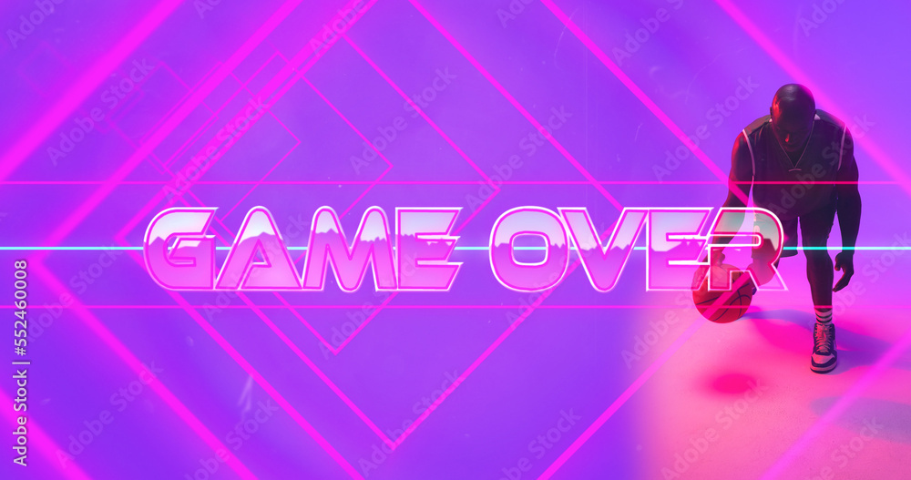 Composite of game over text with pink lines and bald african american player dribbling basketball