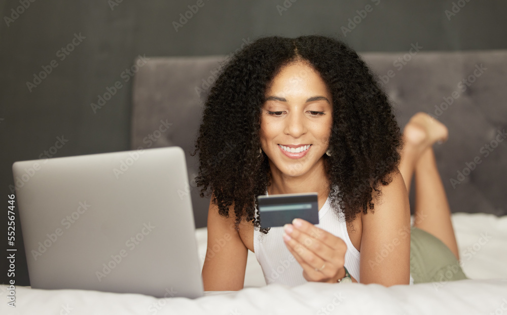 Credit card, online shopping or black woman on bed with laptop for bill payment, ecommerce or invest