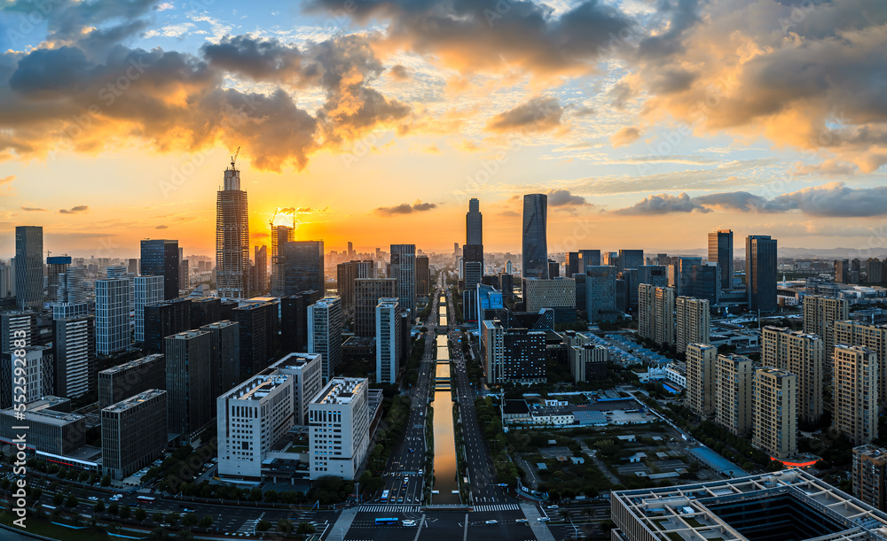 Aerial view of city skyline and modern buildings at sunrise in Ningbo, Zhejiang Province, China. Eas