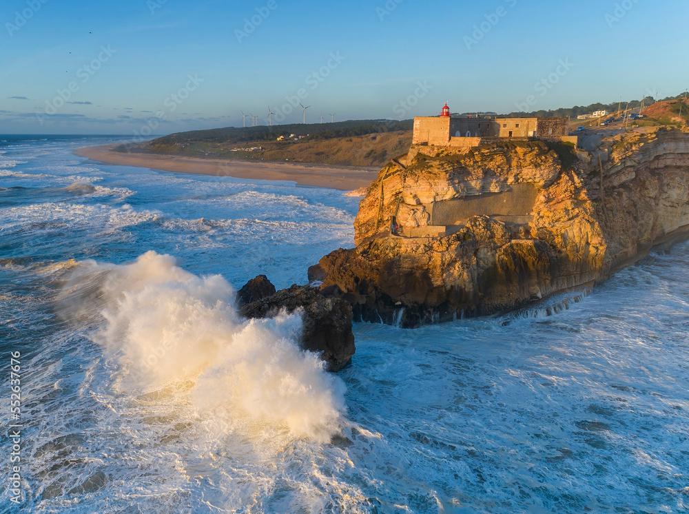 Lighthouse and big waves at in Nazare